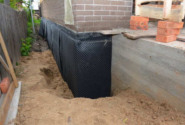 SJ Waterproofing Pros technician performing targeted Sump Pump Installation assessment in Highland, MD